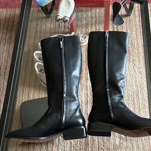 Elegant Black Leather Heeled Boots